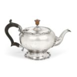 A George V Silver Teapot, by Russells Ltd., London, 1916, baluster and on spreading shaped foot, the