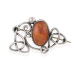 An Arts & Crafts Style Agate Brooch, an oval cabochon agate centrally in a white collet setting,