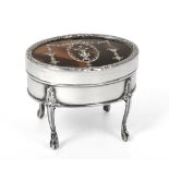 An Edward VII Silver-Mounted Tortoiseshell Box, by William Comyns, London, 1909, oval and on four