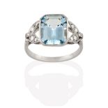 An Aquamarine and Diamond Ring, the emerald-cut aquamarine to leaf motif shoulders set throughout