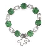 A Jade Bracelet, seven circular pierced jade plaques in white claw settings alternate with fancy