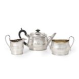 A Three-Piece Victorian Silver Tea-Service, by Thomas Bradbury, London, 1891, each piece oval and