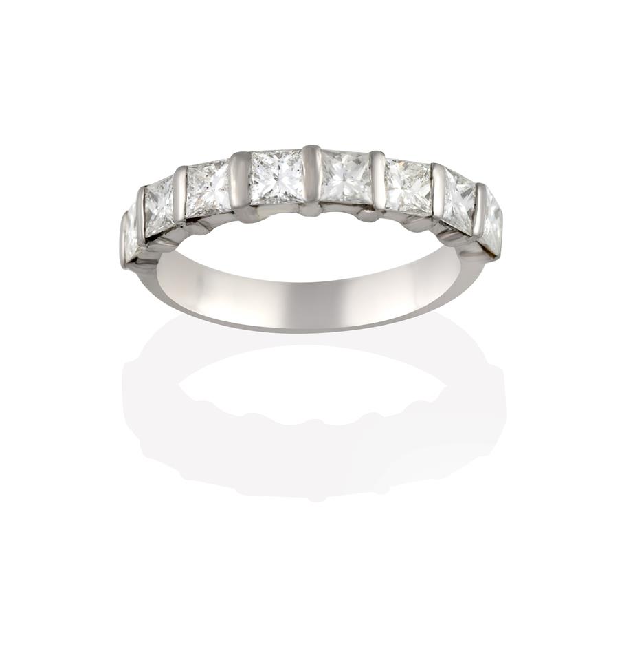 A Diamond Half Hoop Eternity Ring, the princess cut diamonds spaced by white bars, to a plain