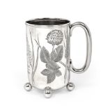 A Victorian Silver Mug, by Barker Brothers, Birmingham, 1895, cylindrical and on four ball feet, the