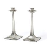 A Pair of Edward VII Silver Candlesticks, by James Dixon and Sons, Sheffield, 1906, each in the Arts