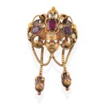 A Victorian Garnet and Chrysoberyl Brooch, three oval cut garnets and six oval cut chrysoberyl in