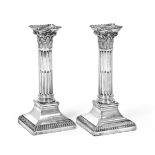A Pair of George V Silver Candlesticks, by Hawksworth, Eyre and Co. Ltd., Sheffield, 1923, each on