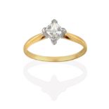 A Diamond Solitaire Ring, the princess cut diamond in a white four claw setting, to a yellow tapered