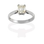 An 18 Carat White Gold Diamond Solitaire Ring, the emerald-cut diamond in a four claw setting, to