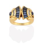 A Sapphire and Diamond Ring, of geometric double fan design, formed of calibré cut sapphires and