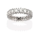 A Diamond Eternity Ring, the continuous band formed of marquise cut diamonds alternating with