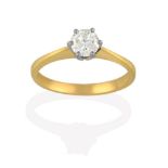 An 18 Carat Gold Diamond Solitaire Ring, the round brilliant cut diamond in a white claw setting, to
