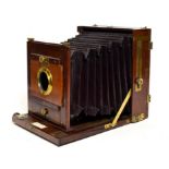 London Stereoscopic Co. Plate Camera 6x8'', mahogany body with brass fitting with makers plaque to