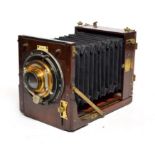 Ross Plate Camera 5x4'', mahogany body with brass fittings, Bausch & Lomb shutter 'Pat Jan 6 91';