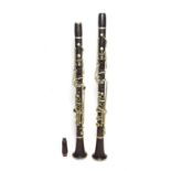 Pair Of Clarinets both stamped on all sections 'Jacques Albert Fils' both upper and lower joints