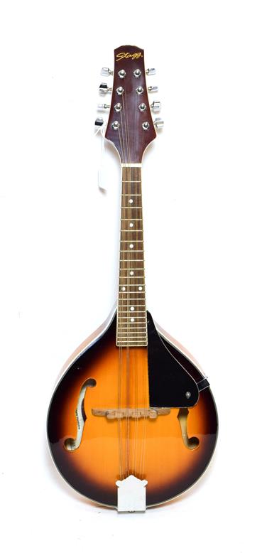 Ukelele Banjo 7 3/4'' head, 16 frets, with plaque on headstock 'George Formby Registered', reverse