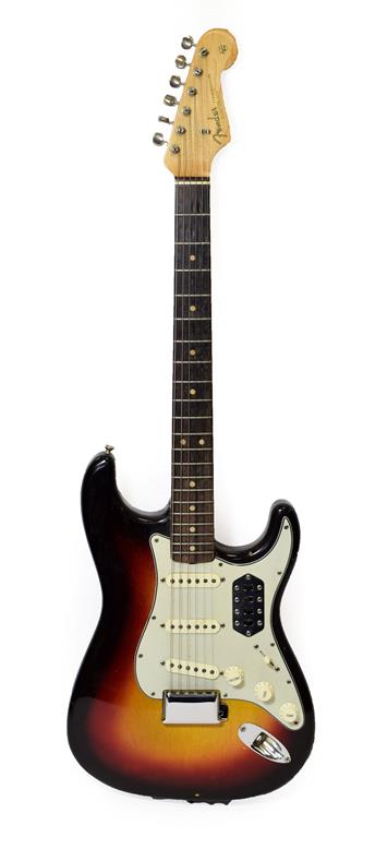 Fender Stratocaster Guitar (1963) serial no.L17506 on four screw plate, black sunburst finish with