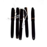 Two Swan No.2 fountain pens with nibs stamped 14ct, a Swan No.3 fountain pen with nib stamped