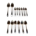 A collection of George III silver flatware, comprising: a pair of Old English pattern table-