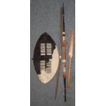 Zulu hide dance shield, two modern spears and a self bow