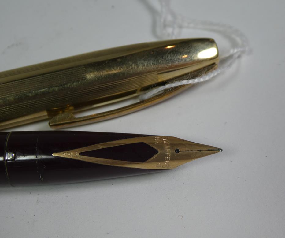 A Sheaffer fountain pen with nib stamped 14K, the case stamped Made In Australia, a Sheaffer - Image 4 of 6