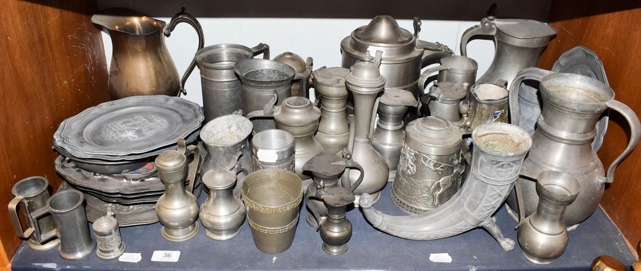 ~ A quantity of Continental pewter items, tankards, ewers and plates etc including Belgian,