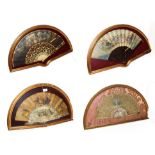 ~ Four fans each in a gilt framed wall hanging display case, comprising two with bone sticks and