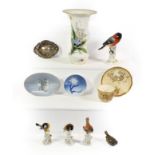 A 20th century Meissen model of a bird, Royal Copenhagen items, Royal Worcester tea cup and