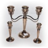 An Elizabeth II weighted silver three light candelabra by A T Cannon Ltd, Birmingham 1973,