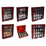 ~ Six collectors cases containing 105 Zippo lighters, including Elvis Presley, Beatles, Harley