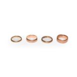 Three 9 carat gold band rings, finger sizes N1/2, P and Q; and another, indistinctly marked,