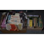 Two boxes of various books including sport, together with a group of mid 20th century fabrics