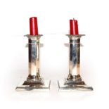 A pair of George V weighted silver dwarf candlesticks by Hawksworth, Eyre & Co Ltd. With