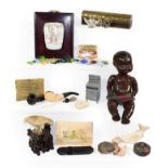 A tray of collectables including a Chinese porcelain plaque, composition doll, fossils,