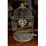 An early 20th century brass wirework bird cage