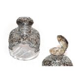 A Victorian silver-mounted glass scent-bottle, by William Comyns, London, 1894, the shaped square