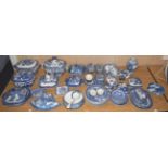 A quantity of 19th century Old Willow pattern blue and white tureens and covers, plates and