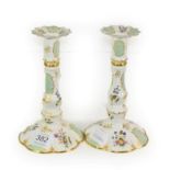 A pair of Halcyon Days Bilston style enamel candlesticks, 16cm high. Good overall condition