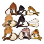 ~ A collection of Meerschaum pipes including an erotic example and others formed as Turks (1 tray)