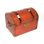 An early 20th century painted dome-top workbox, with brass strapwork and studded decoration, side