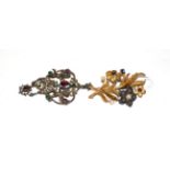 ~ A late 19th century gilt floral spray brooch set with rose cut diamonds, a synthetic sapphire with