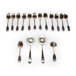 A collection of silver flatware, Fiddle pattern, some engraved with differing initial, comprising: