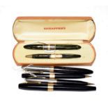 A Sheaffer fountain pen with nib stamped Lifetime 14K (engraved case) and matching pencil, a