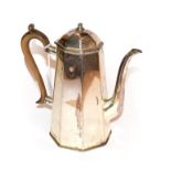A Victorian silver coffee-pot, by George Howson, Sheffield, 1896, tapering octagonal and with carved