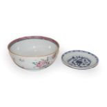 An 18th century Chinese Famille Rose bowl and a Tek Sing Cargo blue and white plate