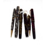 A Merlin 33 fountain pen with nib stamped 14k, a Merlin 33 fountain pen with nib stamped 14k-585,