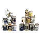 ~ A collection of mainly German pottery steins with pewter mounts, including Westerwald salt