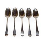 A set of three George III Irish silver table-spoons and a pair of George III silver table-spoons,
