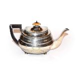 A George III silver teapot, by Thomas Wallis and Jonathan Hayne, London, 1810, oblong and on four