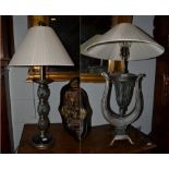 Two modern silvered metal and glass table lamps, one of lyre form